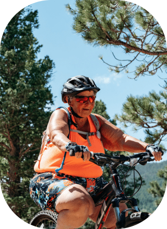 70 yr old woman riding a mountain bike