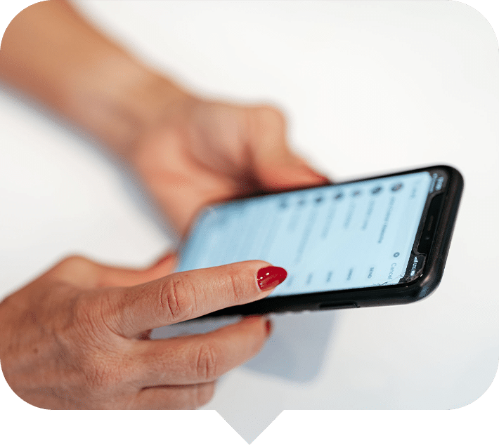 hands holding cell phone