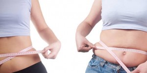 fat and thin woman measures the bellies